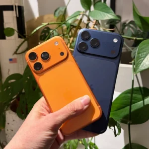 iphone 17 pro max orange and blue in hand 1176x784